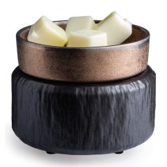 Copper and black 2-in-1 wax warmer with melted wax in the dish
