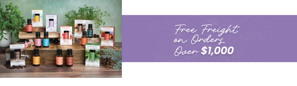 'Free Freight on Orders Over $1,000' banner with a display of Airome room perfume oils